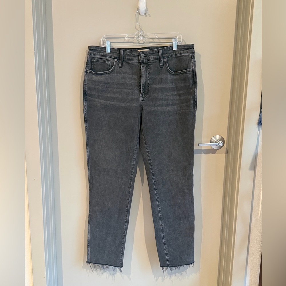 Madewell Curvy Mid-Rise Stovepipe Jeans in a faded black wash